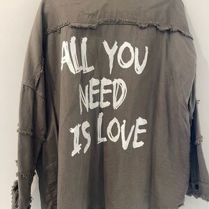 Olive Green Jacket with White Text